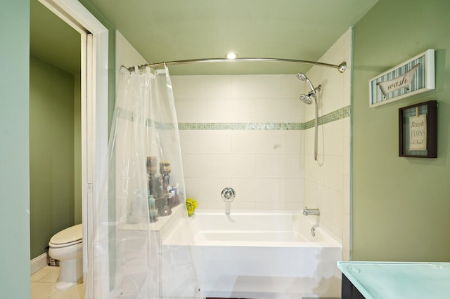 full bathroom featuring tile patterned floors, shower / bath combo, toilet, and vanity