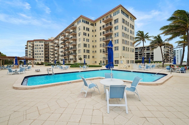 view of pool featuring a patio area