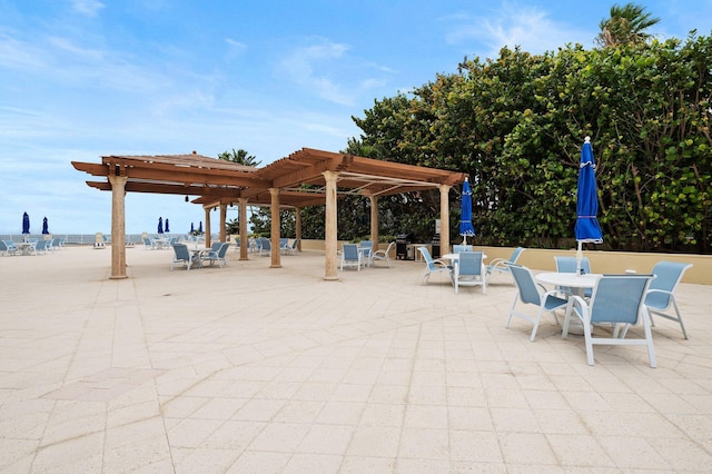 view of patio featuring a pergola