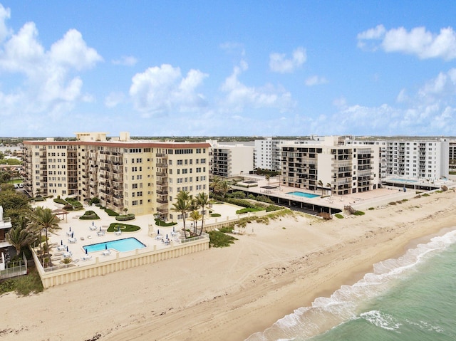 drone / aerial view with a view of the beach and a water view