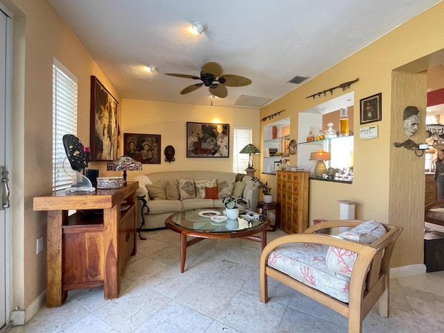 living room with ceiling fan