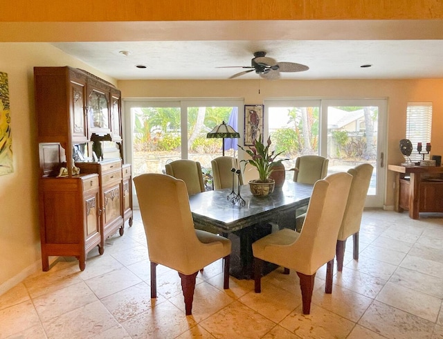 dining room featuring plenty of natural light and ceiling fan