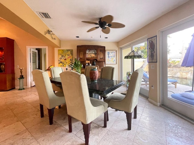 dining area featuring ceiling fan