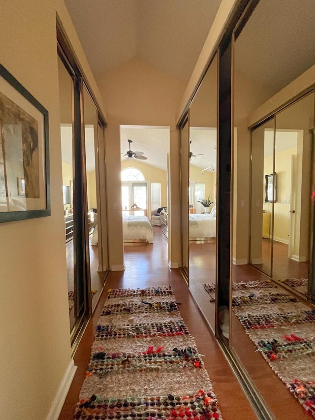 hallway with vaulted ceiling