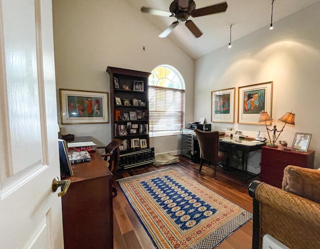 office space featuring ceiling fan, lofted ceiling, and hardwood / wood-style flooring