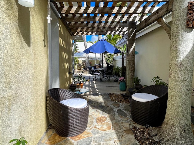 view of patio featuring a pergola