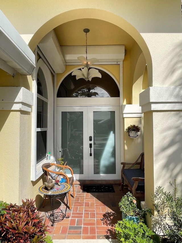 property entrance featuring french doors