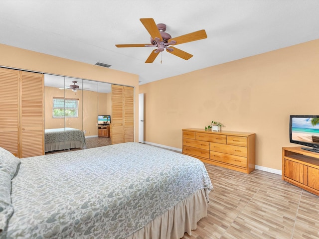 bedroom featuring a closet and ceiling fan