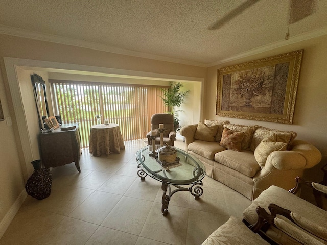 living room featuring light tile patterned flooring, ornamental molding, and a textured ceiling