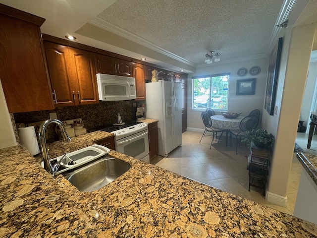 kitchen featuring white appliances, sink, decorative backsplash, ornamental molding, and a textured ceiling