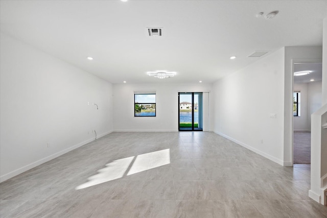 view of tiled spare room