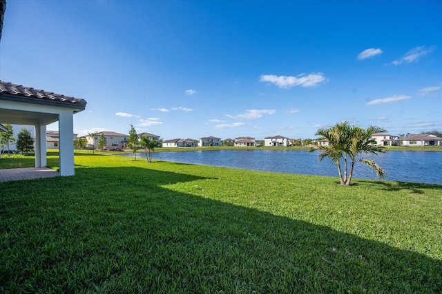 view of yard with a water view