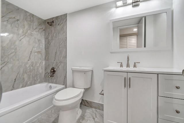 full bathroom with toilet, tiled shower / bath combo, and vanity