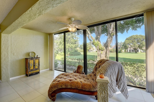 sunroom / solarium with ceiling fan