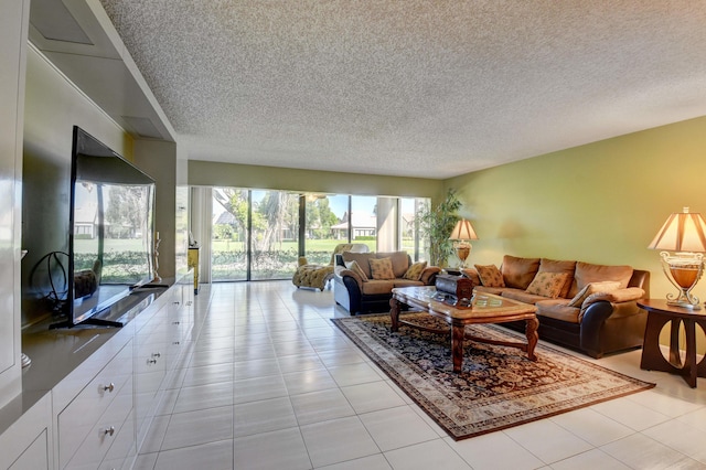 tiled living room featuring a textured ceiling