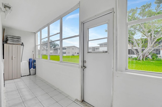 unfurnished sunroom with a wealth of natural light