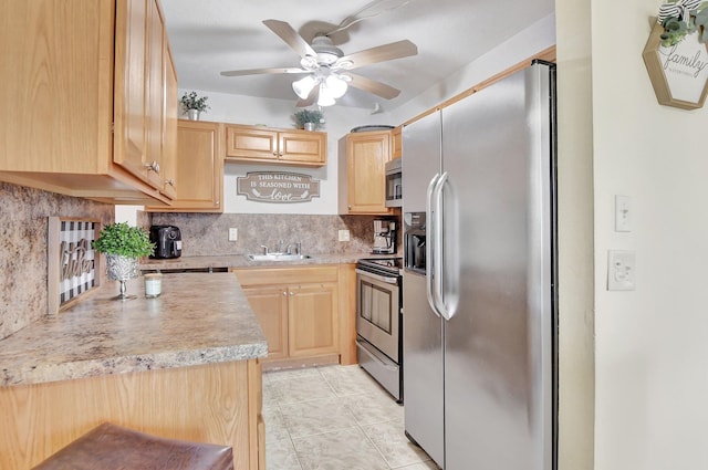 kitchen with light brown cabinets, ceiling fan, backsplash, light tile floors, and appliances with stainless steel finishes