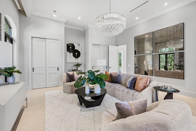 living room with a notable chandelier and crown molding