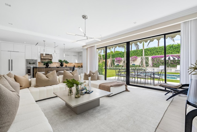 living room with a notable chandelier