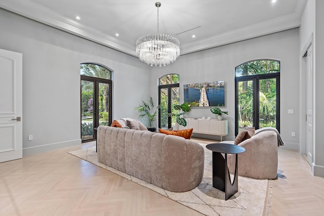 living room with french doors, a wealth of natural light, and light parquet floors