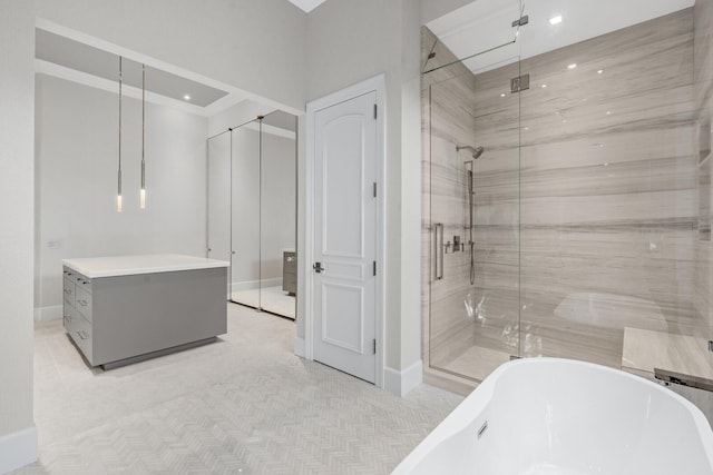 bathroom with tile floors and independent shower and bath