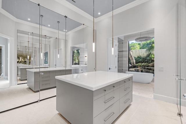 walk in closet with light colored carpet and a high ceiling