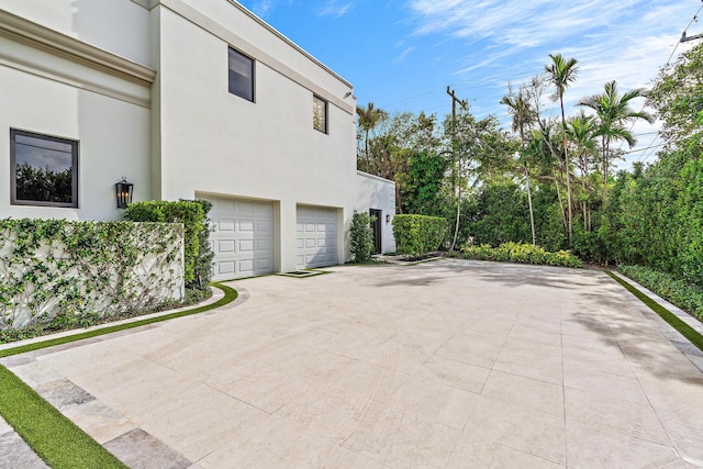 exterior space with a garage