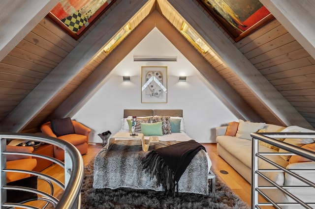 bedroom with beam ceiling, hardwood / wood-style floors, and wood ceiling