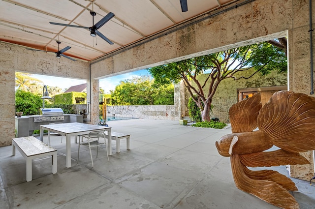 view of patio / terrace with area for grilling and exterior kitchen