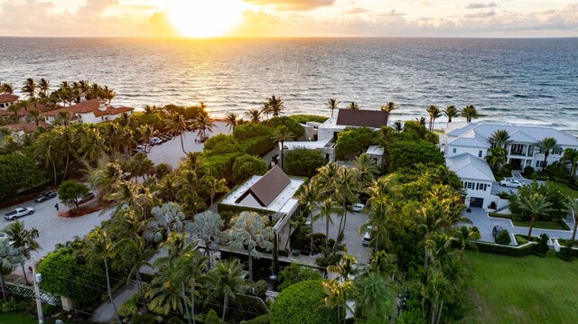 aerial view at dusk with a water view