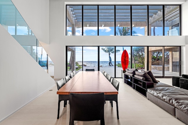 dining room with a water view