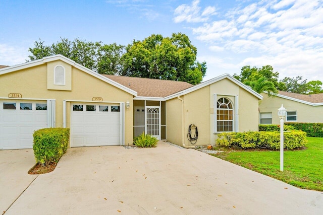 ranch-style house with a front lawn and a garage