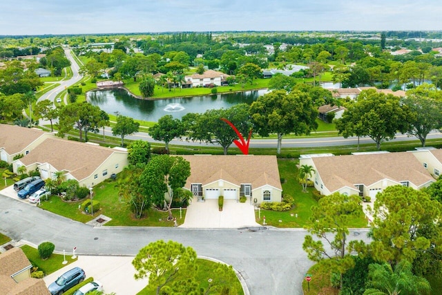 drone / aerial view with a water view