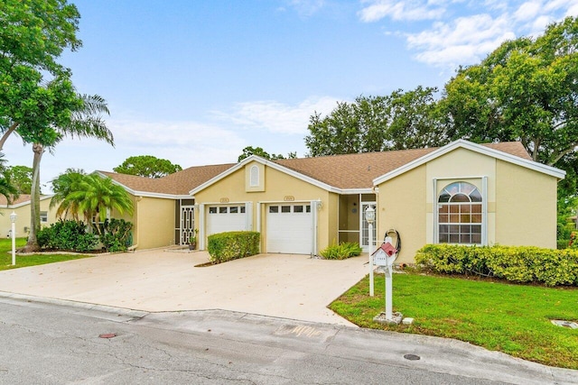 ranch-style house with a front yard and a garage