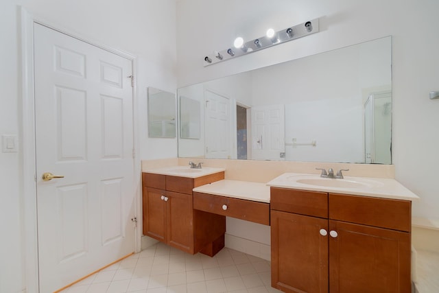 bathroom with tile patterned flooring and vanity