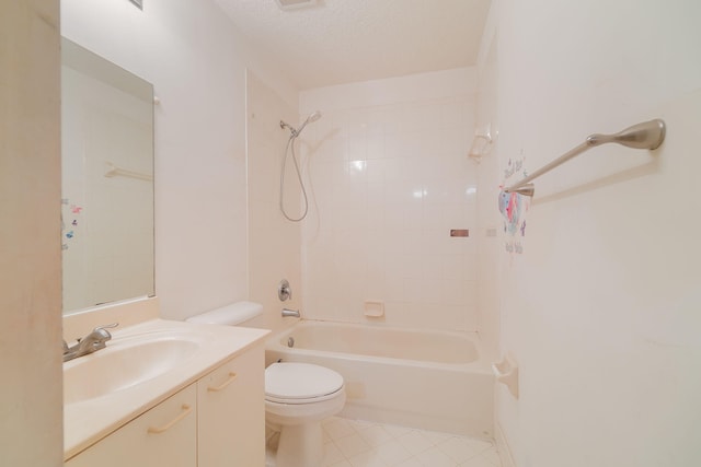 full bathroom with tile patterned flooring, a textured ceiling, toilet, tiled shower / bath combo, and vanity