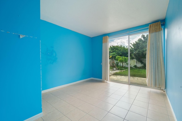 view of tiled spare room