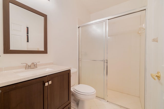 bathroom with walk in shower, tile patterned floors, toilet, and vanity