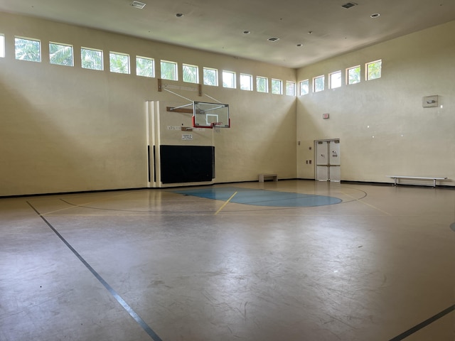 view of basketball court featuring plenty of natural light