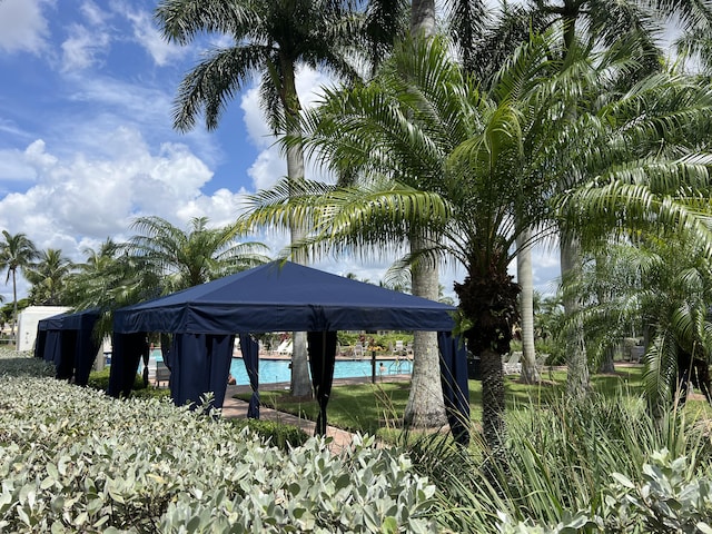 view of community with a gazebo and a swimming pool