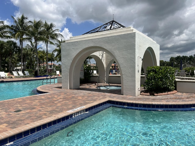 view of pool with a patio area