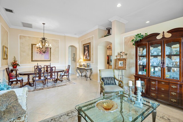 living room featuring crown molding, light tile patterned floors, and a notable chandelier