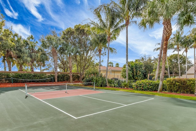 view of tennis court featuring basketball court