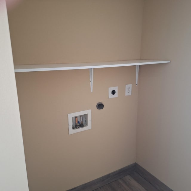 laundry area with hardwood / wood-style floors, electric dryer hookup, and washer hookup