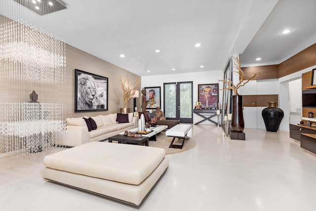 living room featuring an inviting chandelier