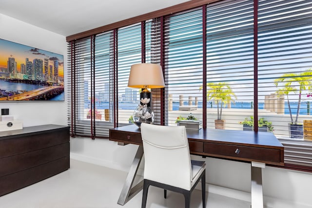 dining room with concrete flooring