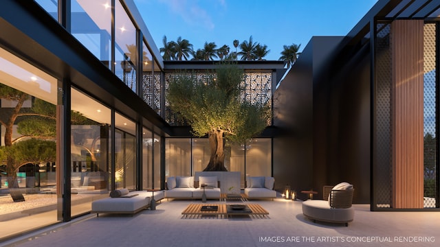 view of terrace featuring an outdoor living space with a fire pit