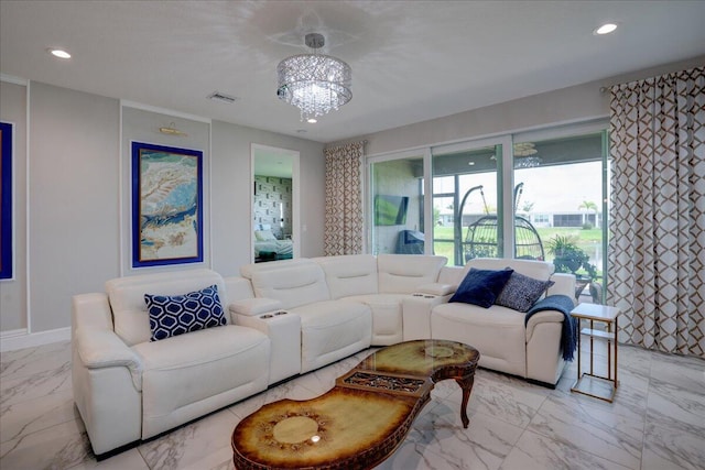 living room with an inviting chandelier