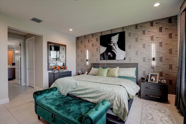 tiled bedroom with tile walls