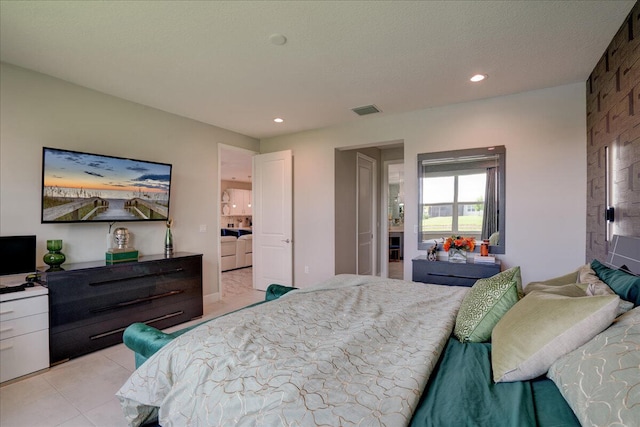 bedroom featuring light tile patterned floors